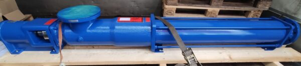 A large blue Fludyn BEH 4500 mono pump without motor, mounted crosswise on a base plate ready for despatch